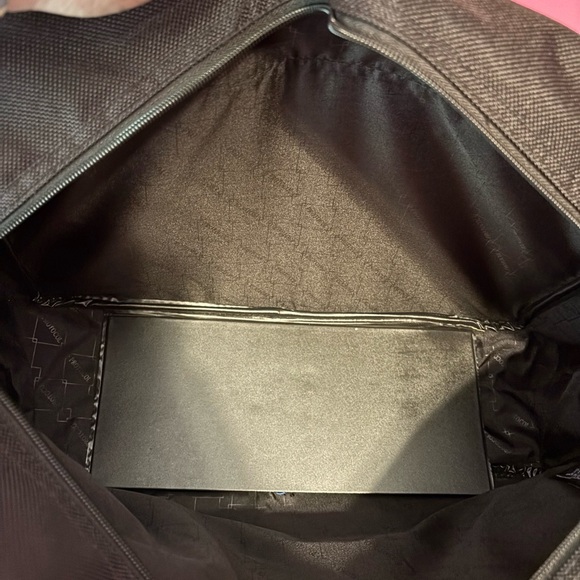 Black Travel Bag with Durable Fabric and Detachable Strap - Picture 7 of 11